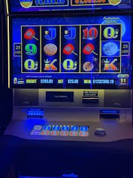 Dream Gaming baccarat table layout showing bet areas and live dealer